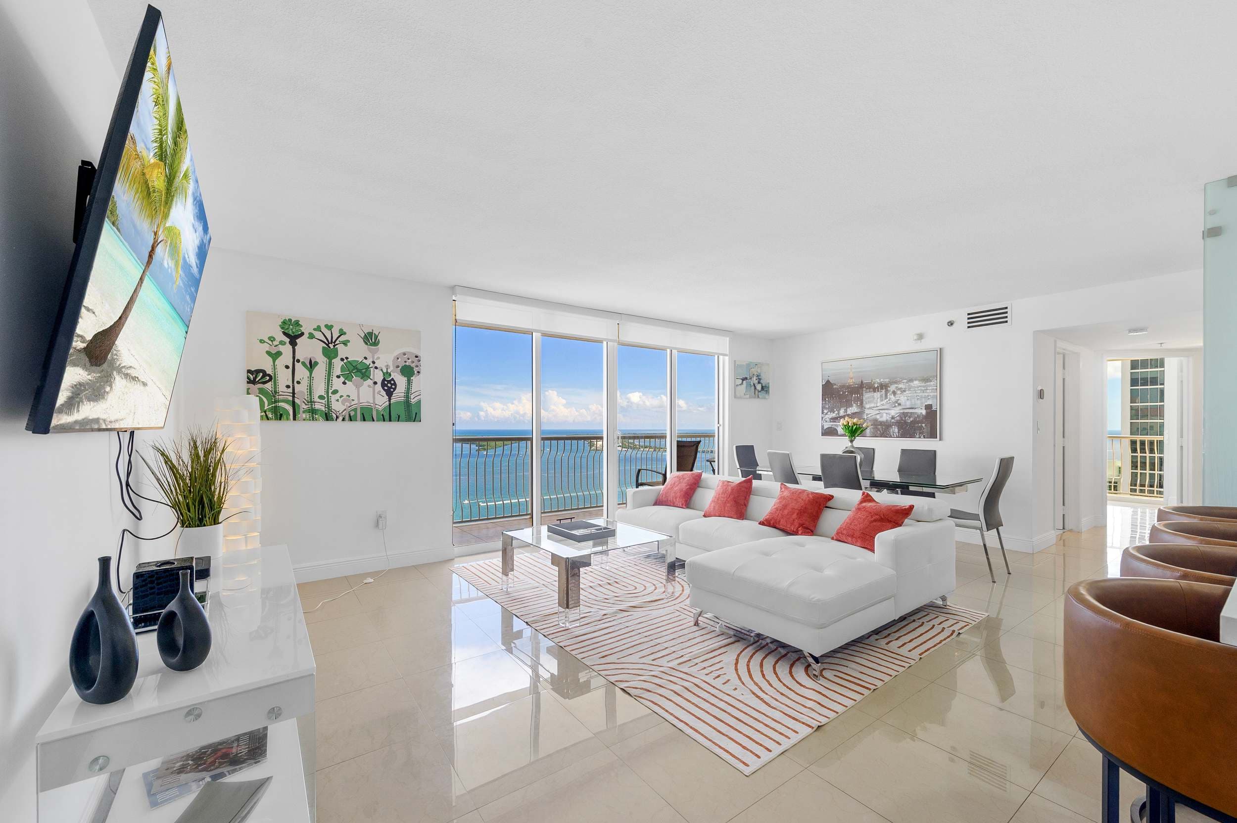 Bright, open-concept living room with a stunning ocean view.