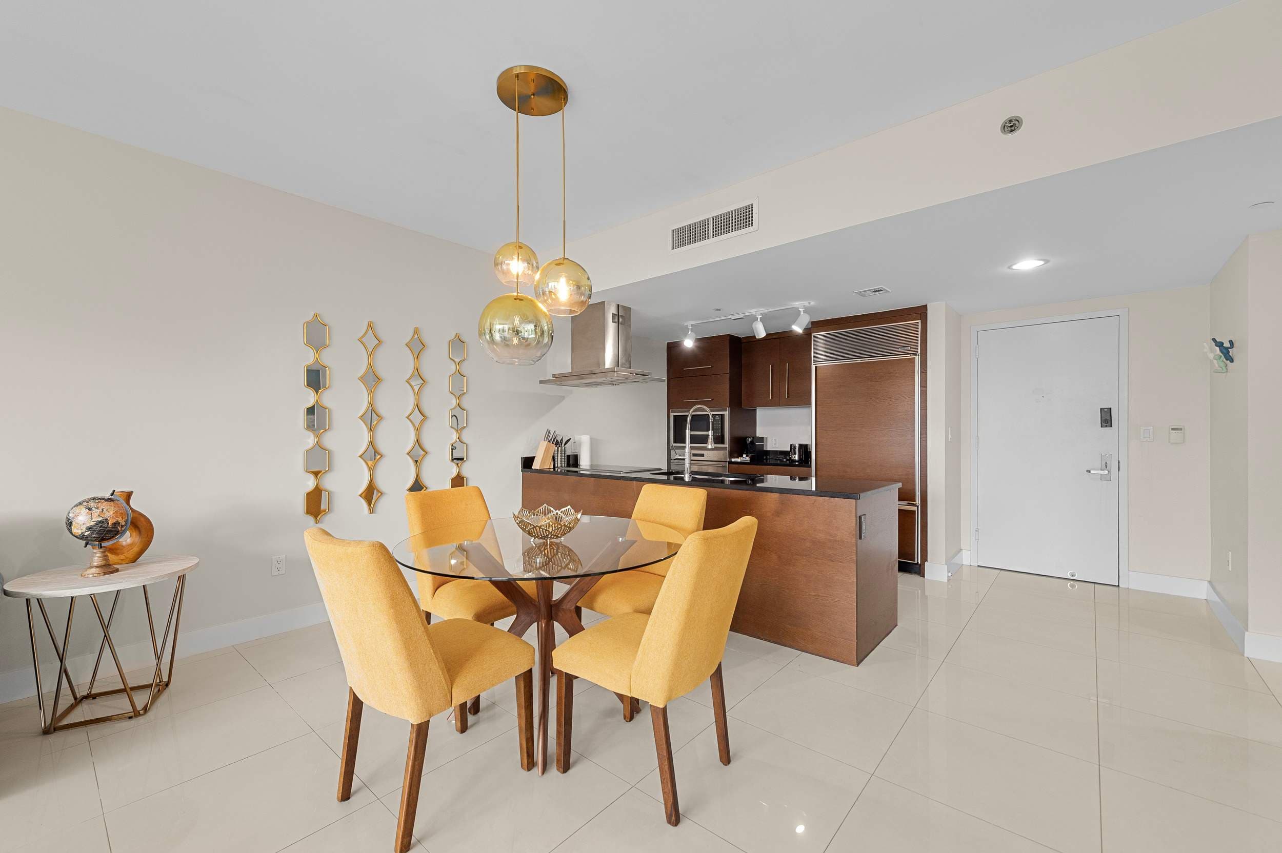 Streamlined kitchen design leading effortlessly into the main living areas.