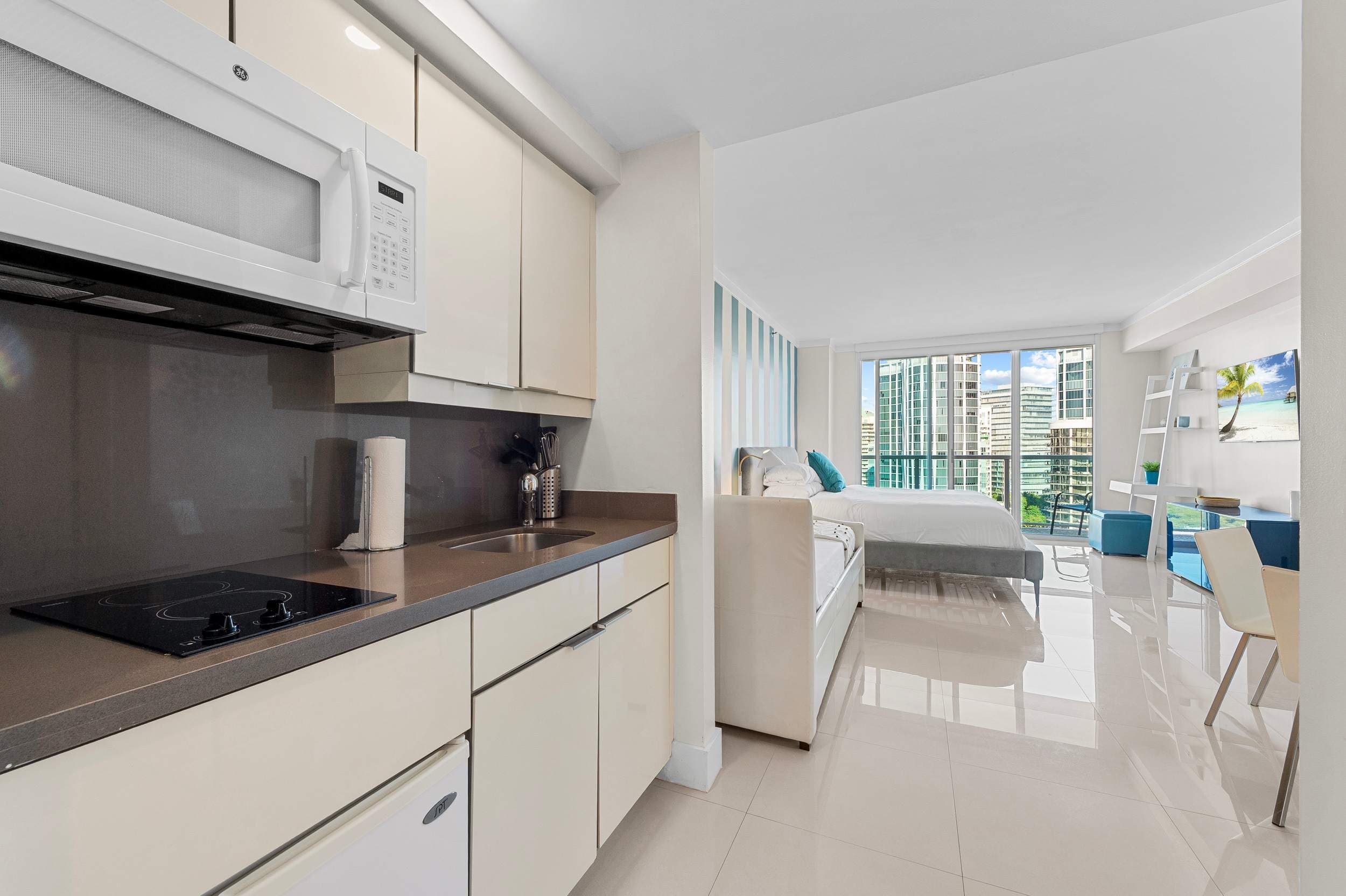 Fully equipped modern white kitchen interior