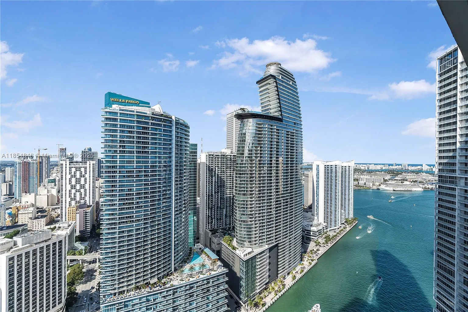 Stunning panoramic views of the surrounding modern architecture and waterfront.