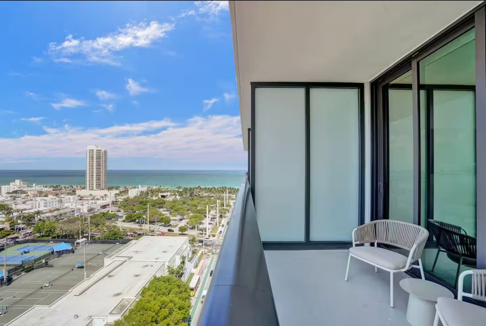 Expansive private terrace overlooking the city skyline.