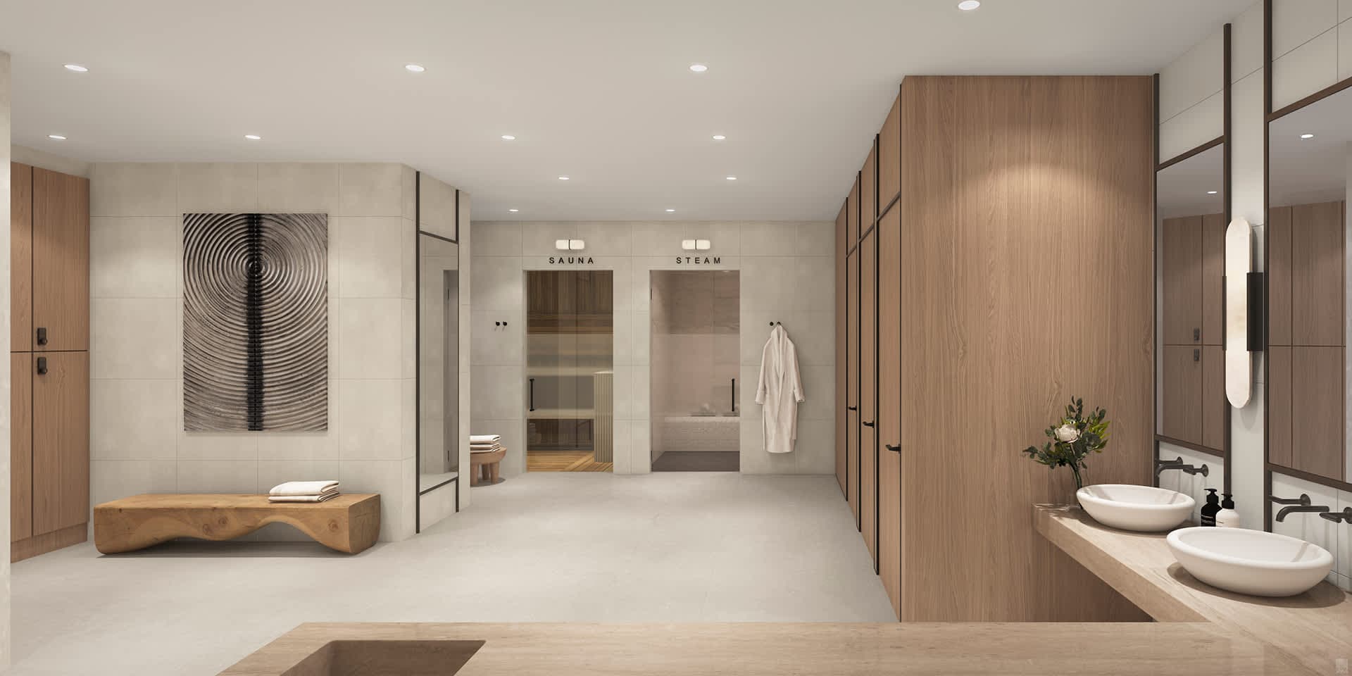 Spa changing room with benches and washbasins.