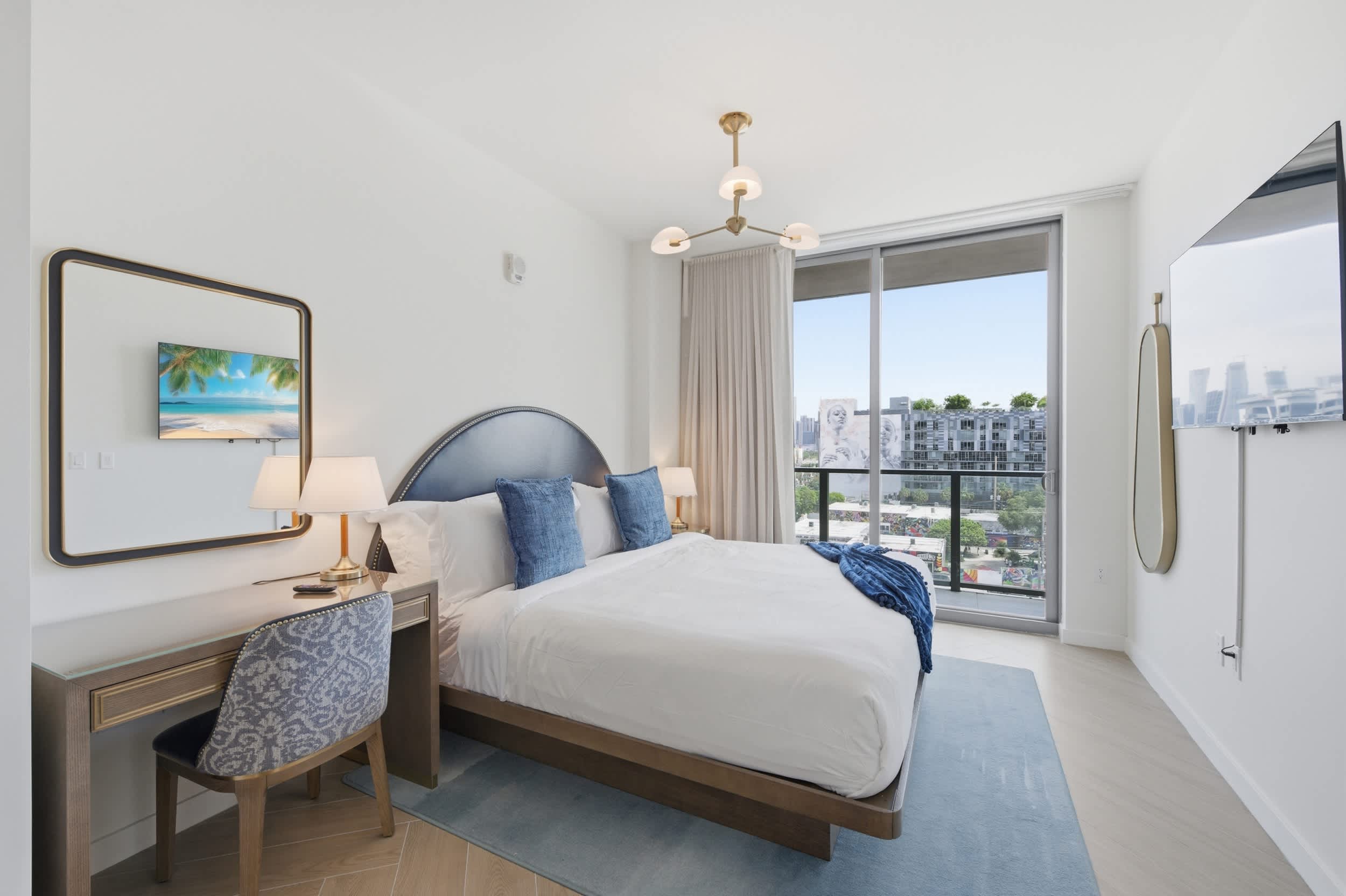Bright, airy corner bedroom overlooking the cityscape.