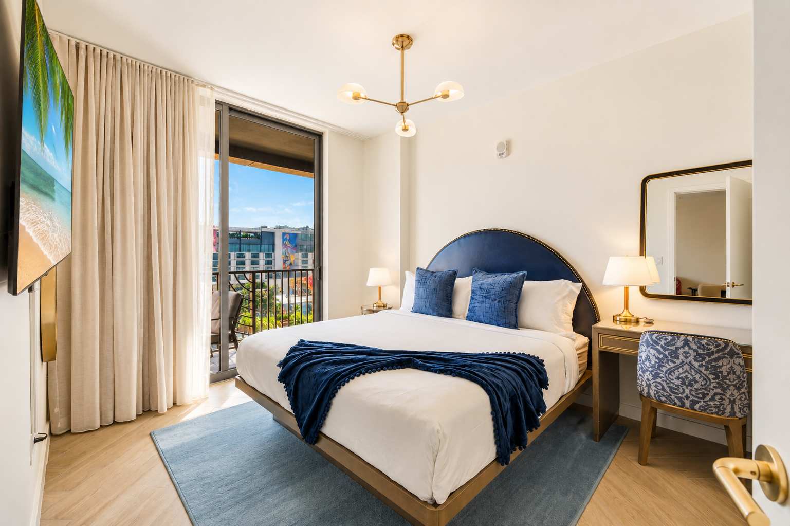 Elegant master bedroom featuring floor-to-ceiling city views.