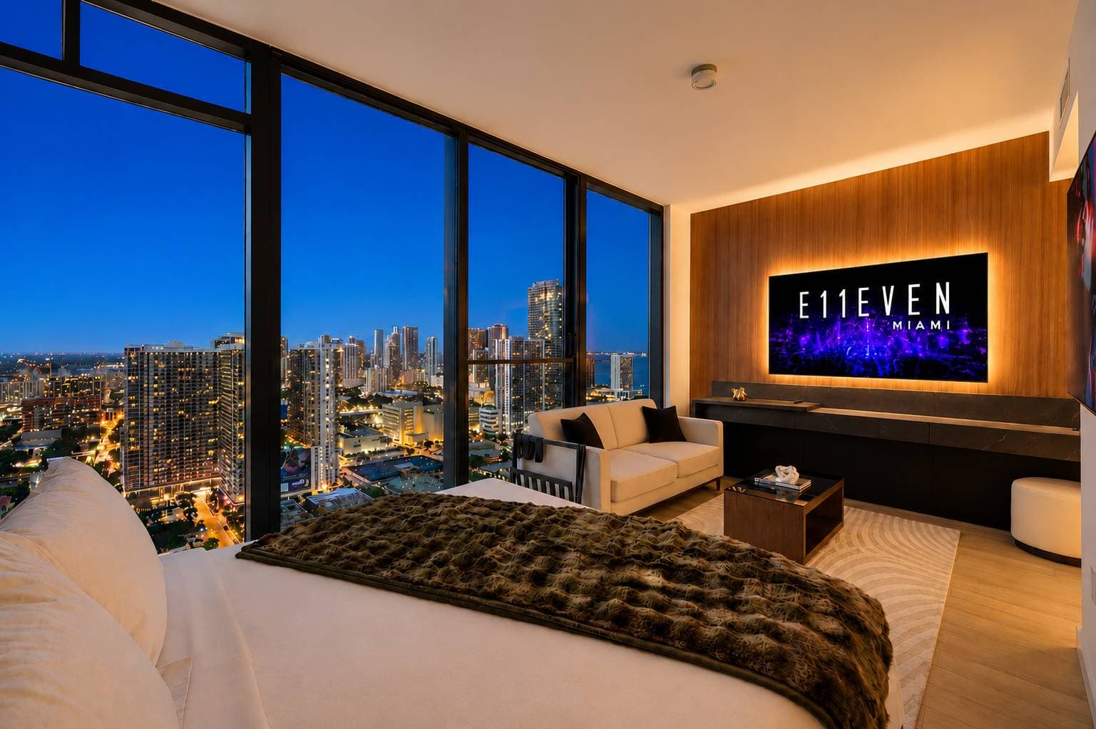 Luxury bedroom with city and water views